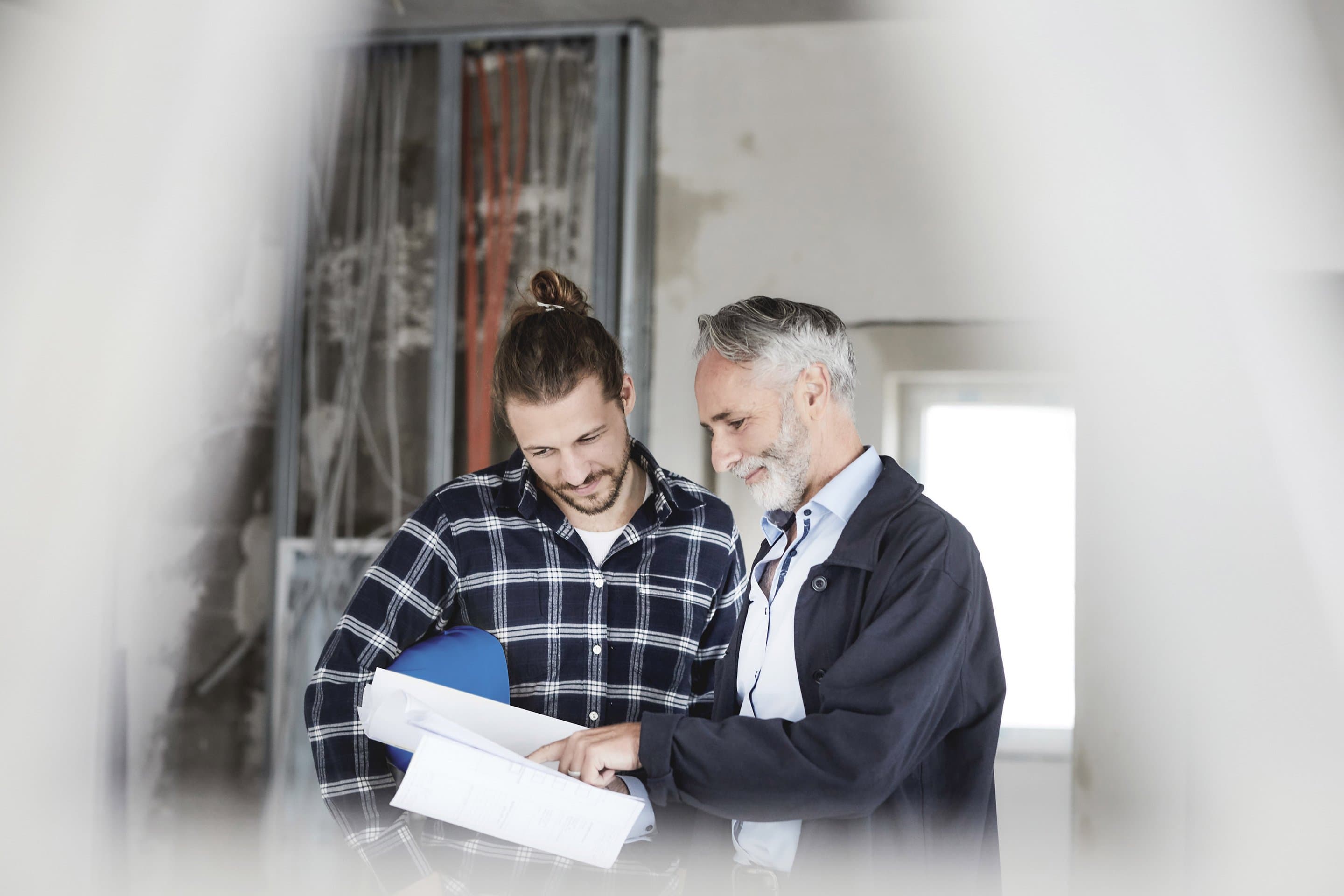 Eigentümer eines Mehrfamilienhauses Symbolbild für Hauseigentümer